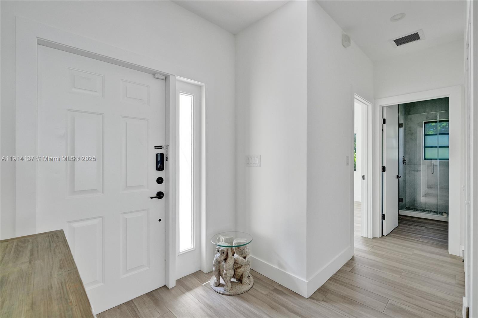 8371 Southwest 122nd Street Miami, FL 33156 - Photo 22 of 39 a view of a hallway with wooden floor and closet area