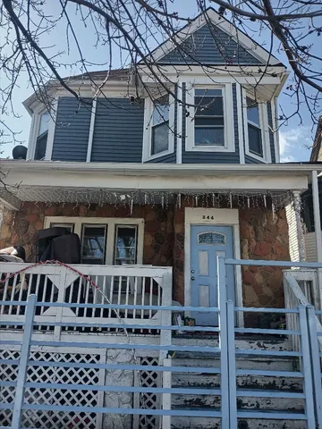 front view of a house with a small roof