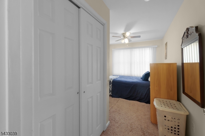 158 Autumn Ridge Road Morris Plains, NJ 07950 - Photo 21 of 26 a bedroom with a bed and a couch