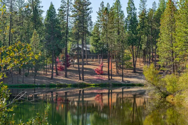 a view of swimming pool and outdoor seating