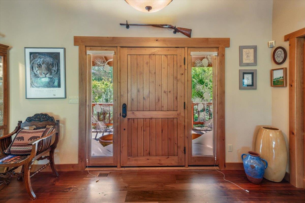 11790 Lowhills Road Nevada City, CA 95959 - Photo 11 of 68 a view of room with furniture and wooden floor