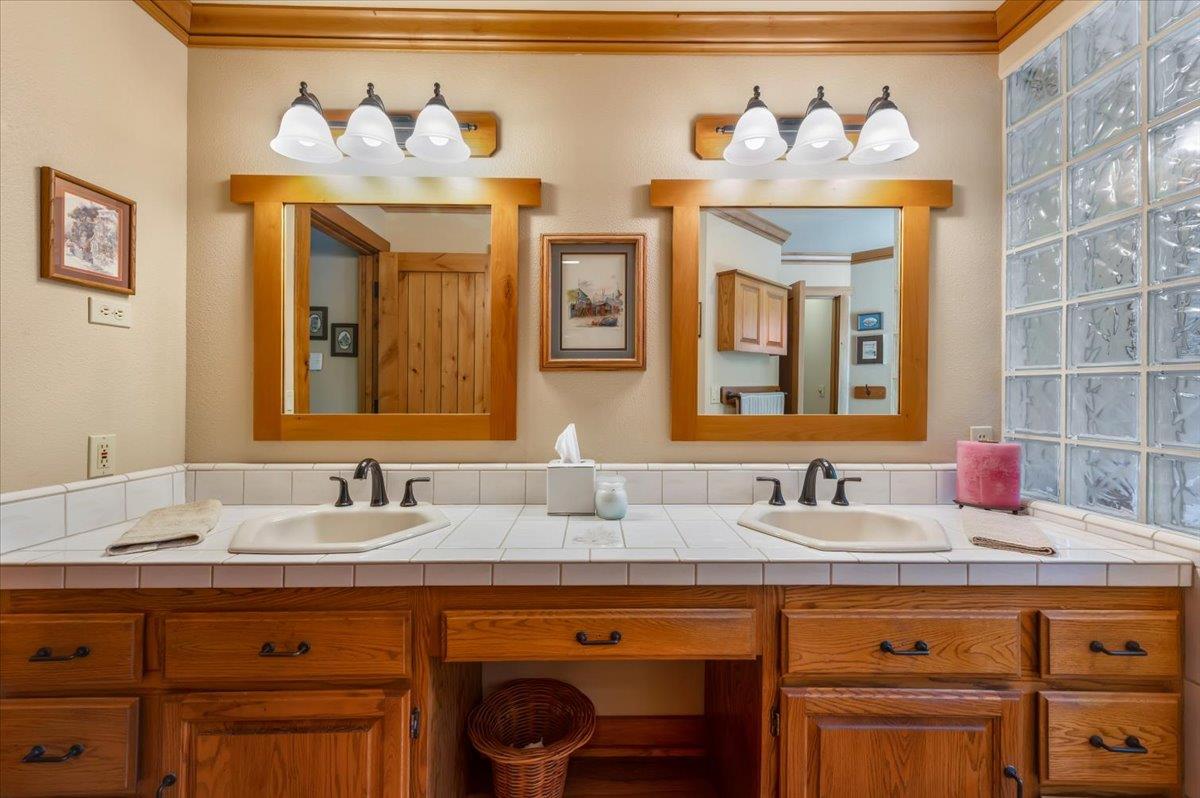 11790 Lowhills Road Nevada City, CA 95959 - Photo 27 of 68 a bathroom with a sink and a mirror