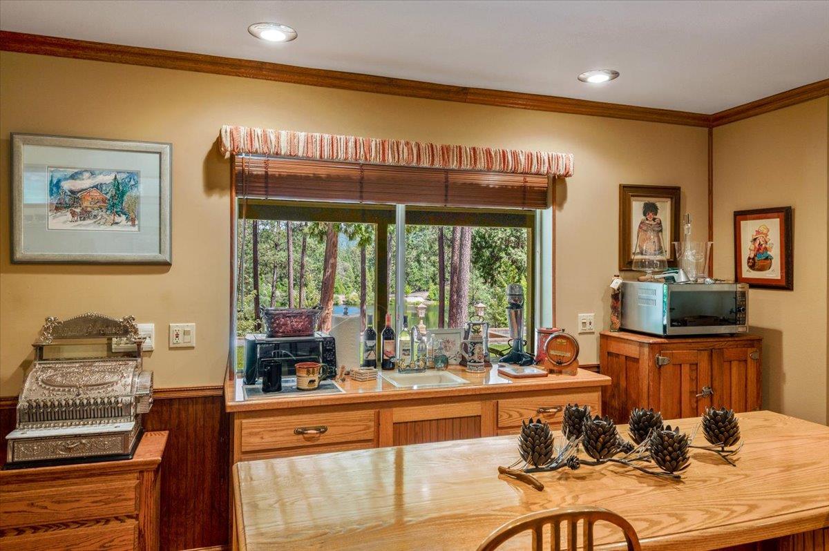 11790 Lowhills Road Nevada City, CA 95959 - Photo 37 of 68 a living room with fireplace furniture and a large window