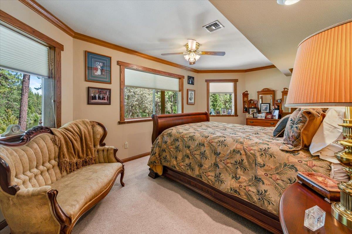 11790 Lowhills Road Nevada City, CA 95959 - Photo 41 of 68 a bedroom with a large bed and a large window