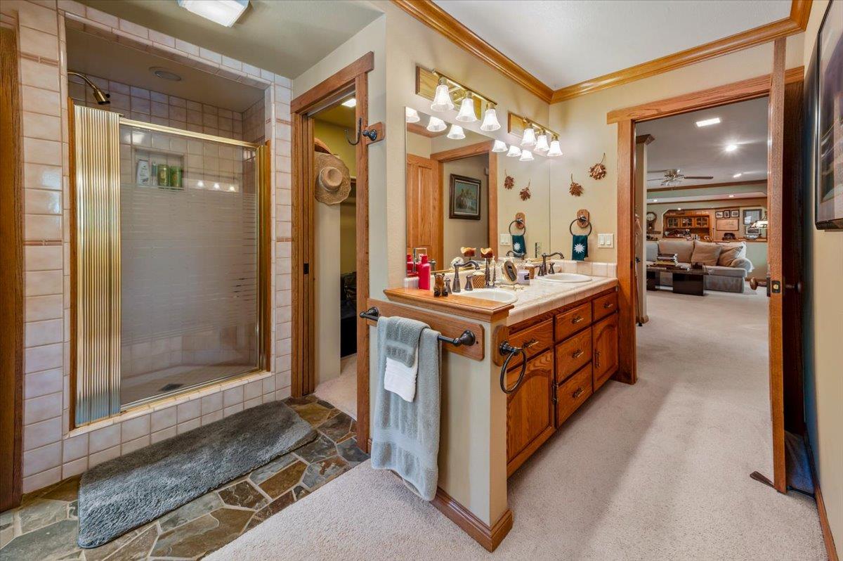 11790 Lowhills Road Nevada City, CA 95959 - Photo 42 of 68 a utility room with stainless steel appliances granite countertop a stove and a refrigerator
