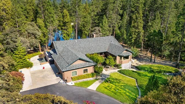 a view of a house with a small yard