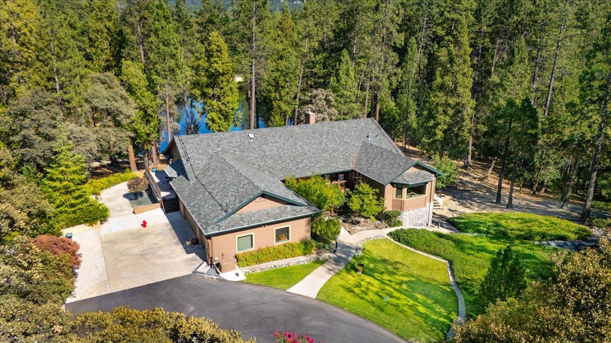 11790 Lowhills Road Nevada City, CA 95959 - Photo 6 of 68 an aerial view of a house with swimming pool garden and patio