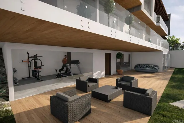 a outdoor living space with furniture and a potted plant