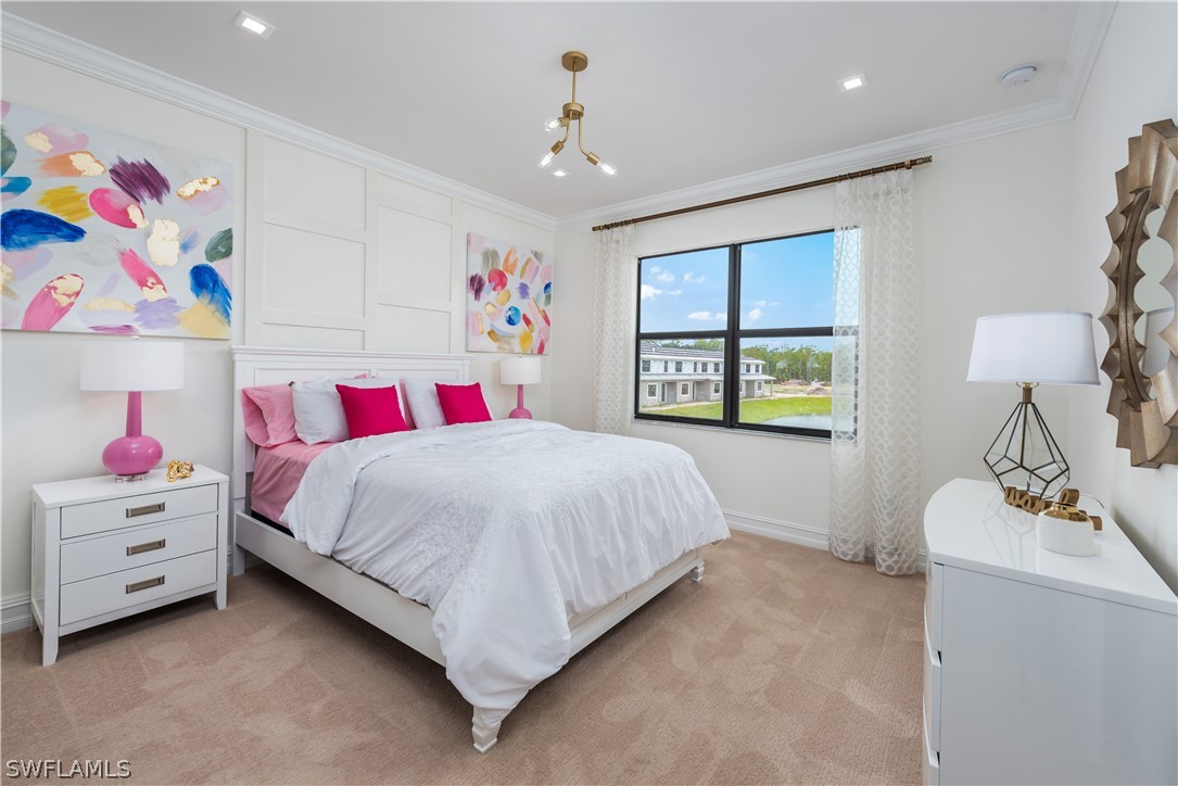 7341 Rockefeller Drive Naples, FL 34119 - Photo 24 of 34 a bedroom with a bed and a window