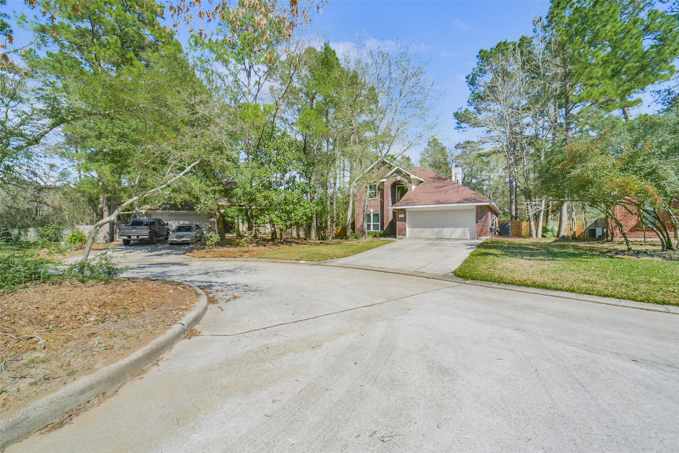 38 Tallow Hill Place Spring, TX 77382 - Photo 50 of 50 a front view of a house with a garden and tree