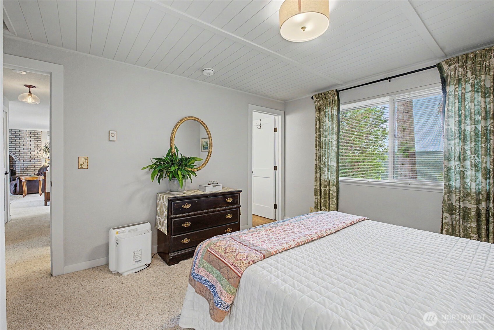 1611 Ham Hill Road Centralia, WA 98531 - Photo 19 of 40 a bedroom with a bed and a dresser