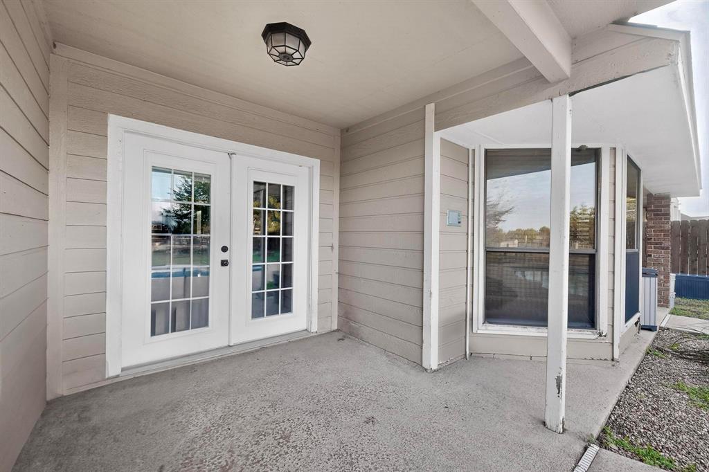 1121 Reedsport Place DeSoto, TX 75115 - Photo 38 of 40 an empty room with windows