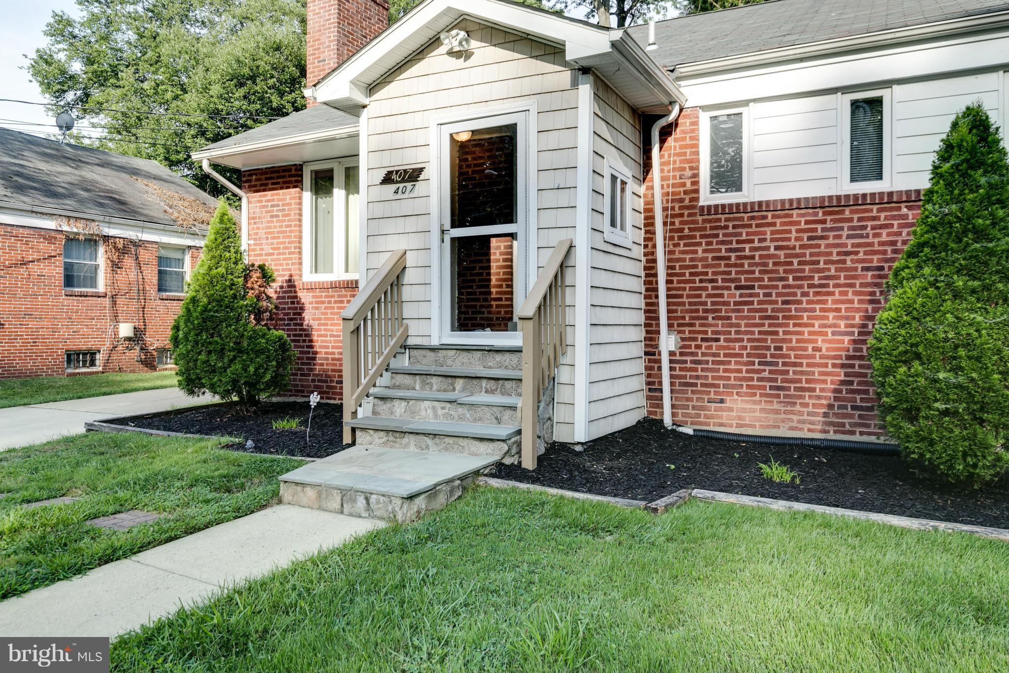 407 Royalton Road Silver Spring, MD 20901 - Photo 1 of 30 a view of a back yard of the house