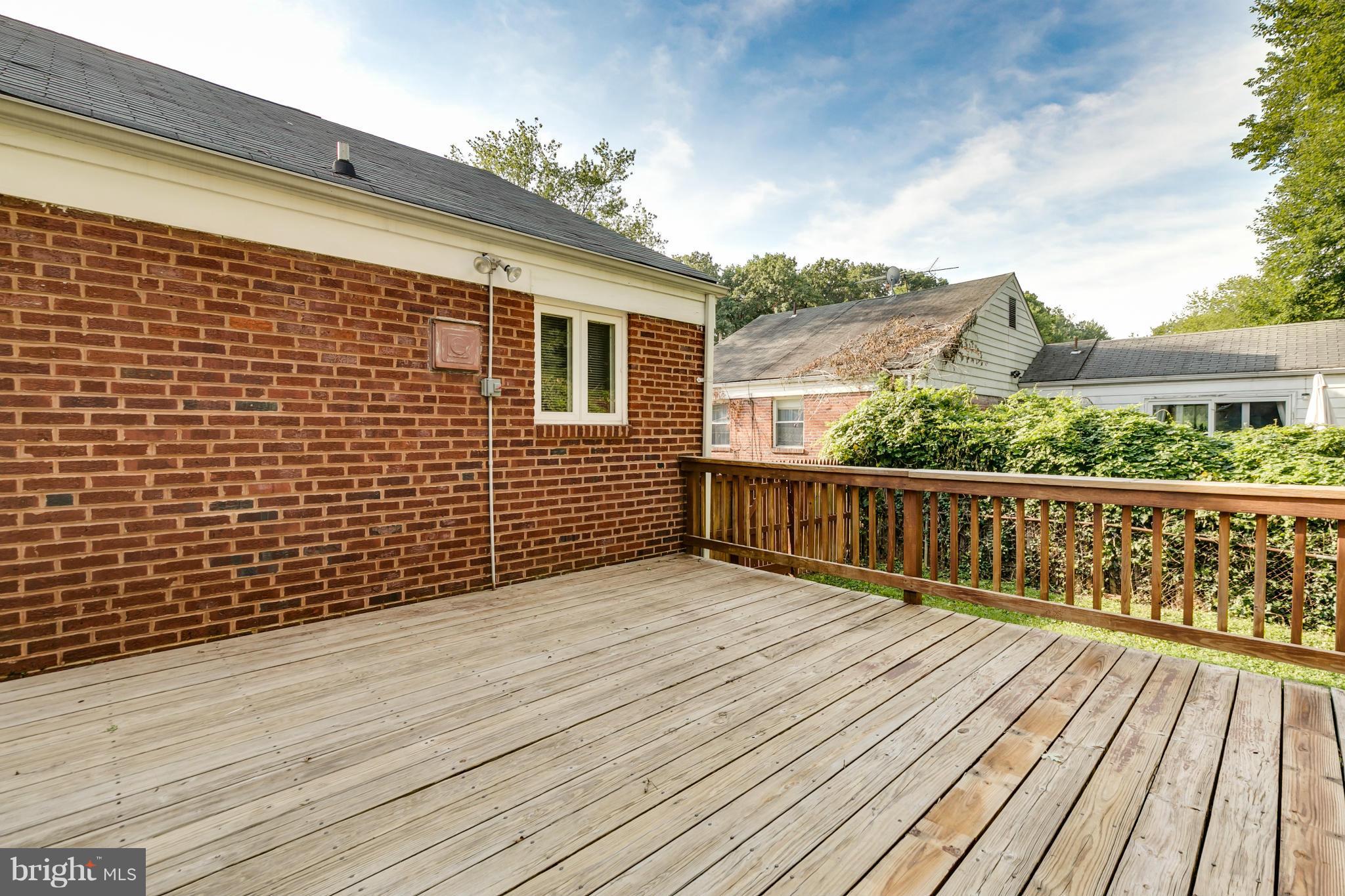407 Royalton Road Silver Spring, MD 20901 - Photo 27 of 30 a view of balcony with wooden floor