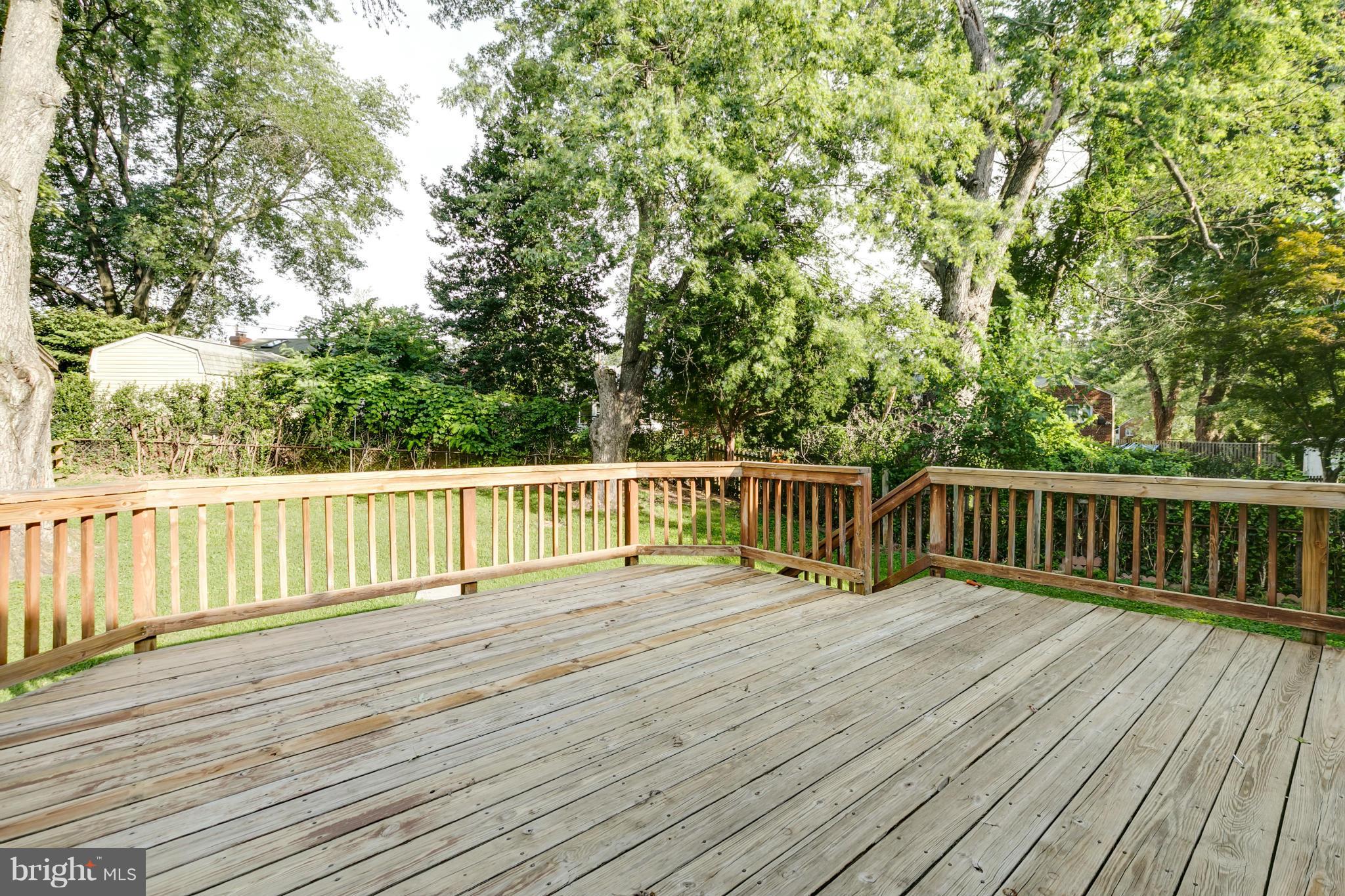 407 Royalton Road Silver Spring, MD 20901 - Photo 29 of 30 a view of balcony with wooden floor and fence