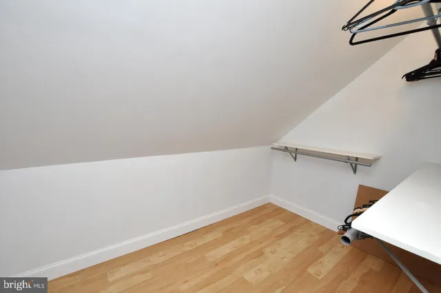 a view of a room with racks on the wall