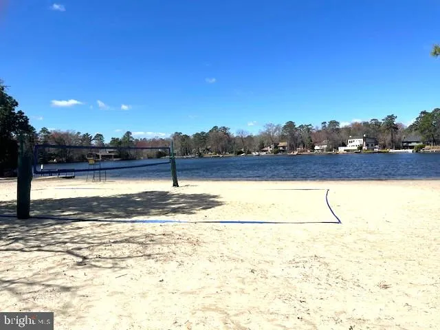 a view of a street with a building in the background