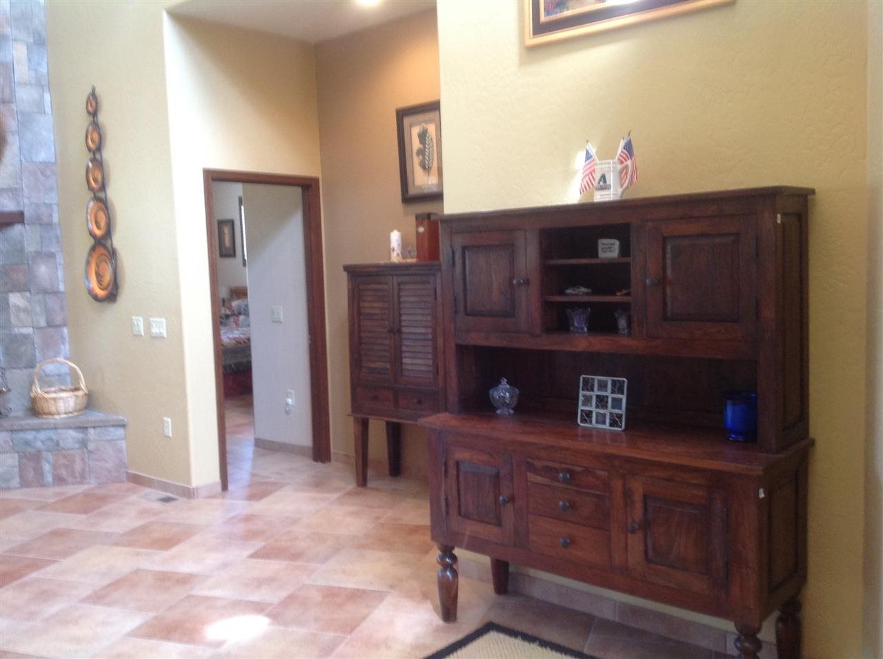 1092 South Hunters Run Show Low, AZ 85901 - Photo 19 of 36 a view of an entryway with wooden floor