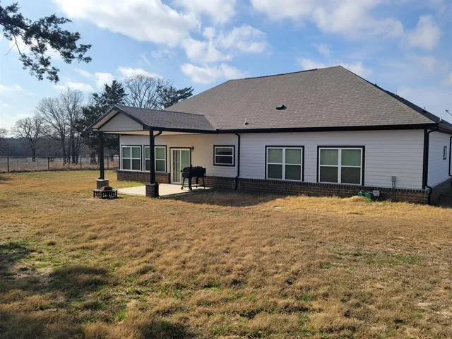 a house view with a garden space