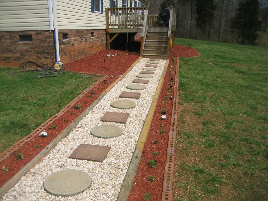 4738 Roundleaf Road Ramseur, NC 27316 - Photo 2 of 19 Walkway to front door.