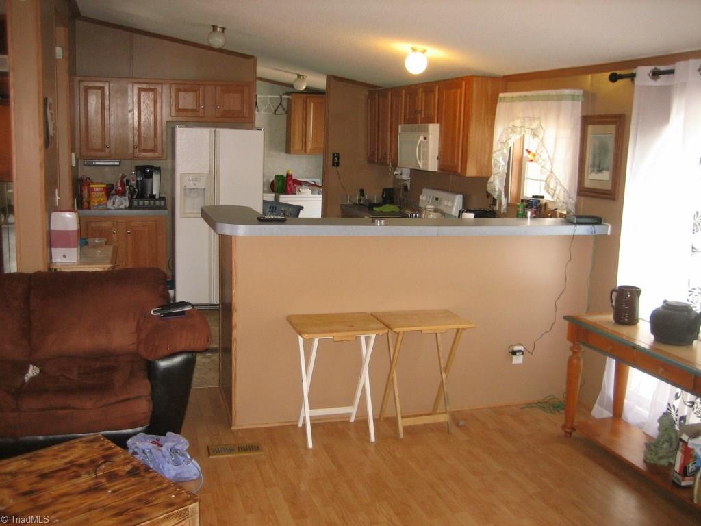 4738 Roundleaf Road Ramseur, NC 27316 - Photo 15 of 19 View of the breakfast bar from the Great Room.