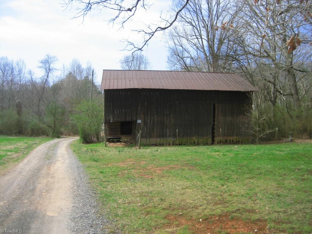4738 Roundleaf Road Ramseur, NC 27316 - Photo 18 of 19 View of the barn at the front of the property.