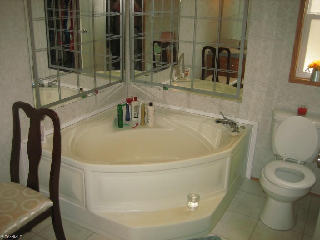 4738 Roundleaf Road Ramseur, NC 27316 - Photo 8 of 19 Her side of the Jack & Jill bath in the master.