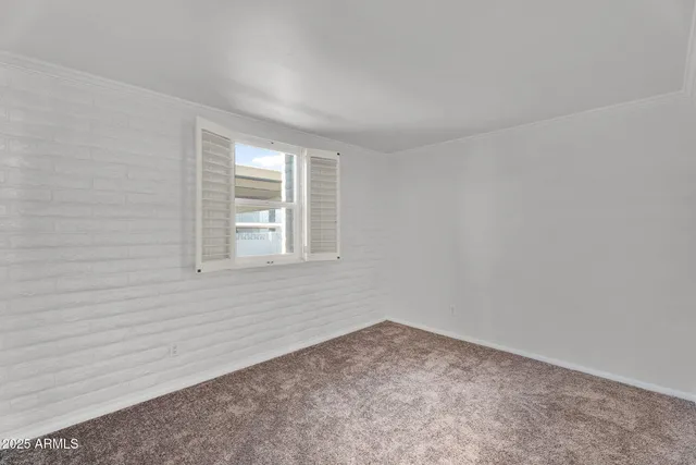 a view of a livingroom with a large window