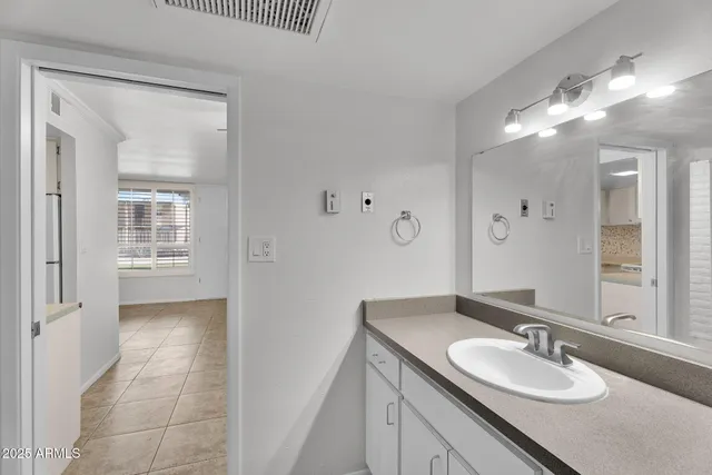 a bathroom with a shower and a toilet