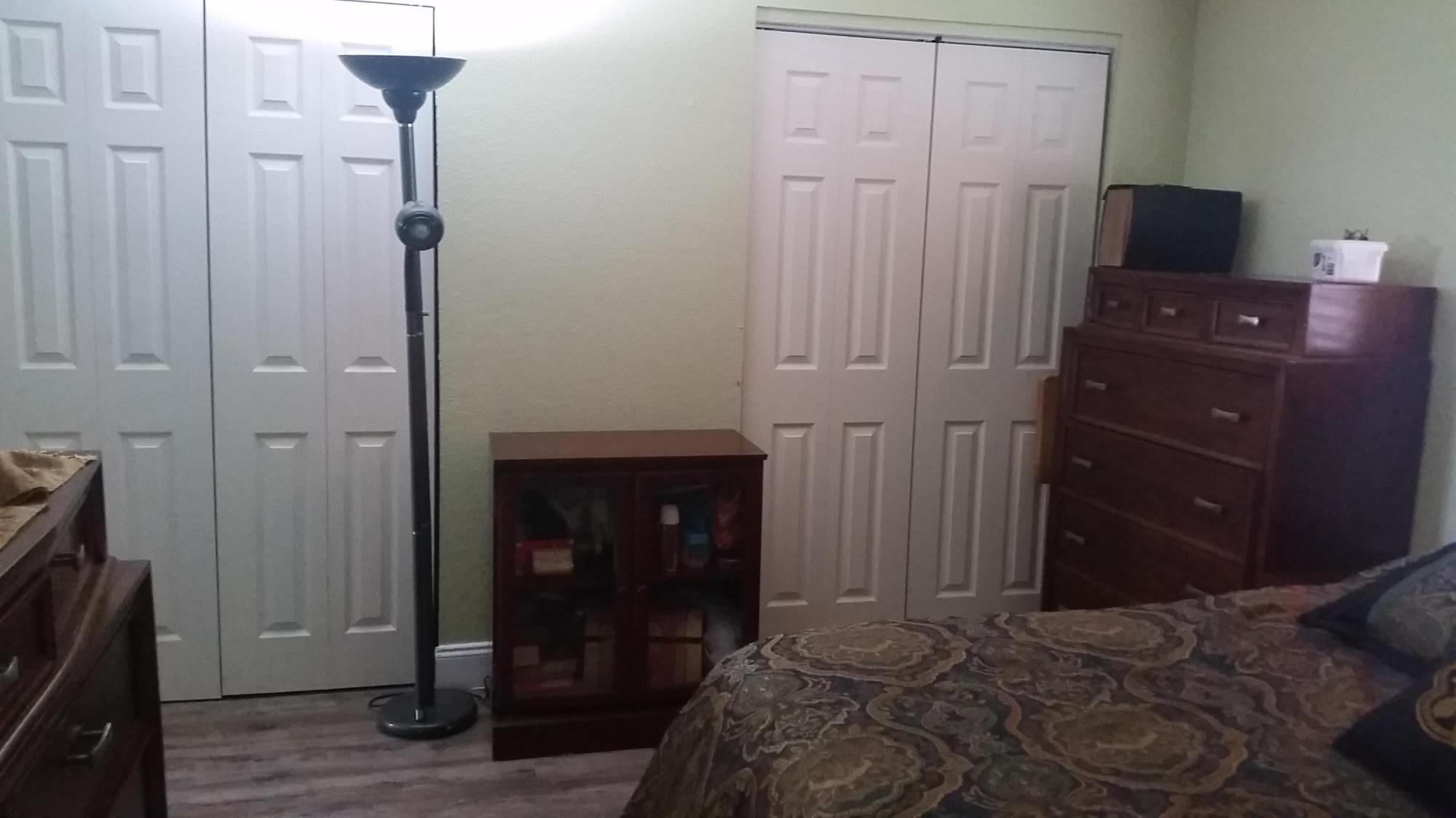 4693 Bison Street Boca Raton, FL 33428 - Photo 18 of 34 a bedroom with a bed and a dresser