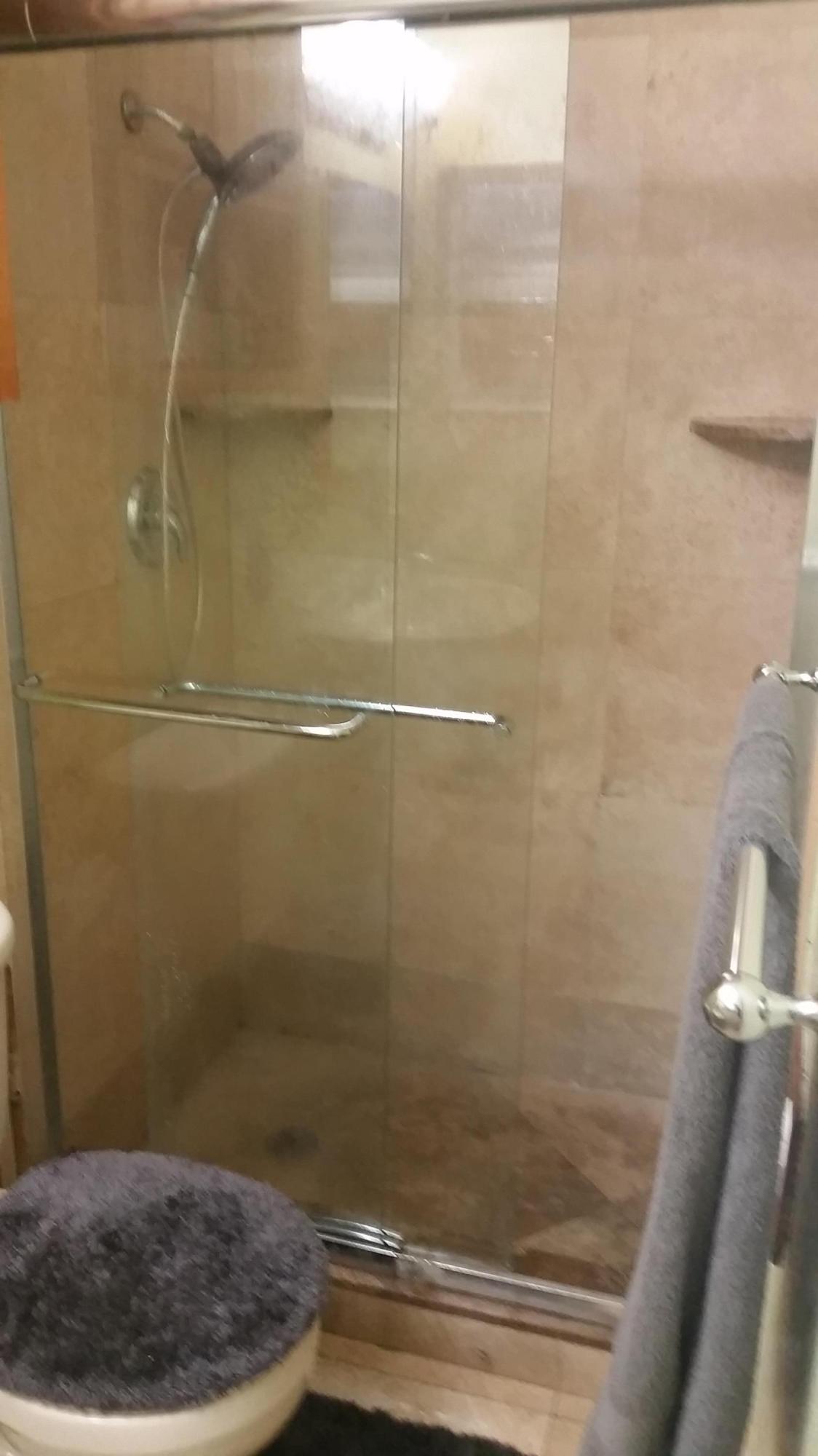 4693 Bison Street Boca Raton, FL 33428 - Photo 21 of 34 a bathroom with a sink and shower