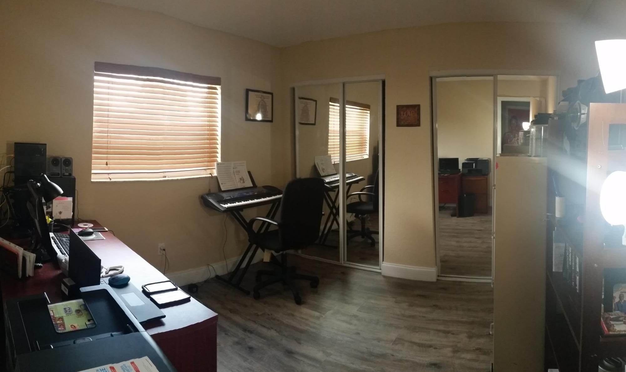 4693 Bison Street Boca Raton, FL 33428 - Photo 26 of 34 a view of workspace with wooden floor and windows