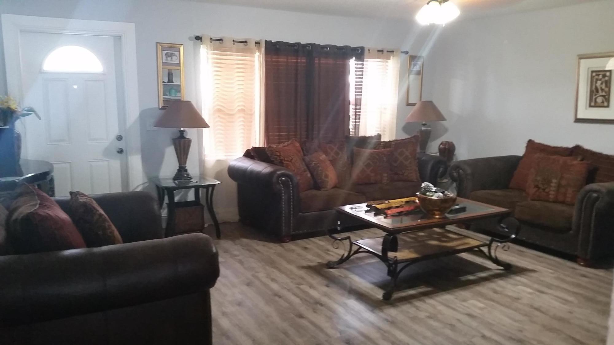 4693 Bison Street Boca Raton, FL 33428 - Photo 7 of 34 a living room with furniture and wooden floor