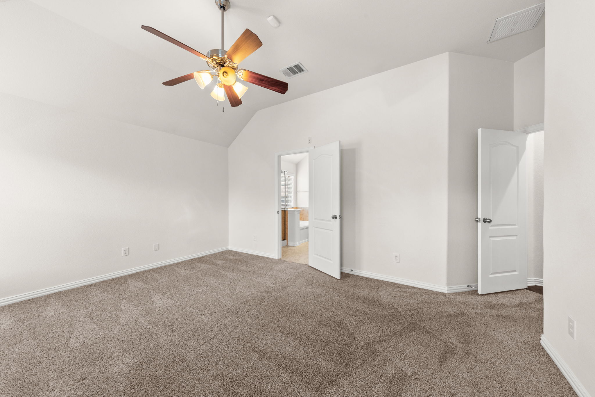 411 Tascate Street Georgetown, TX 78628 - Photo 19 of 41 A quiet retreat with a vaulted ceiling and a cooling fan for ultimate comfort.