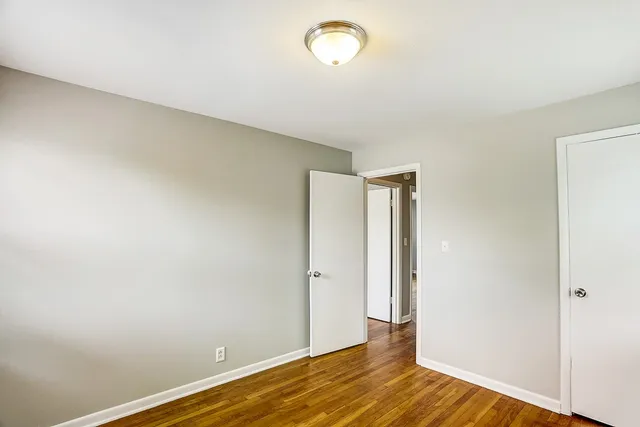 a bathroom with a sink mirror toilet and bathtub