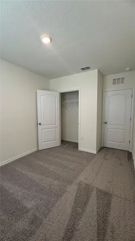 a view of swimming pool from a window