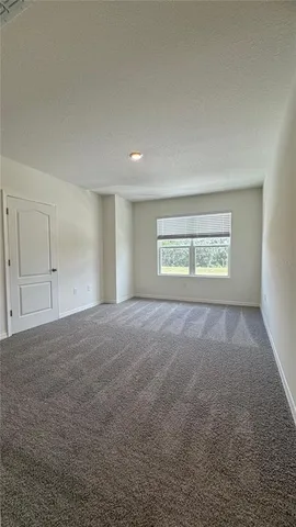 a view of two windows and a balcony