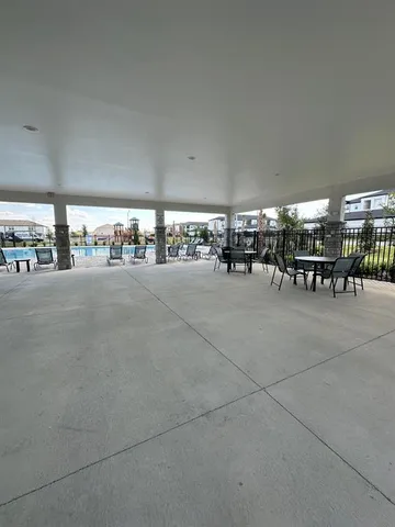 a kitchen with a stove and a refrigerator