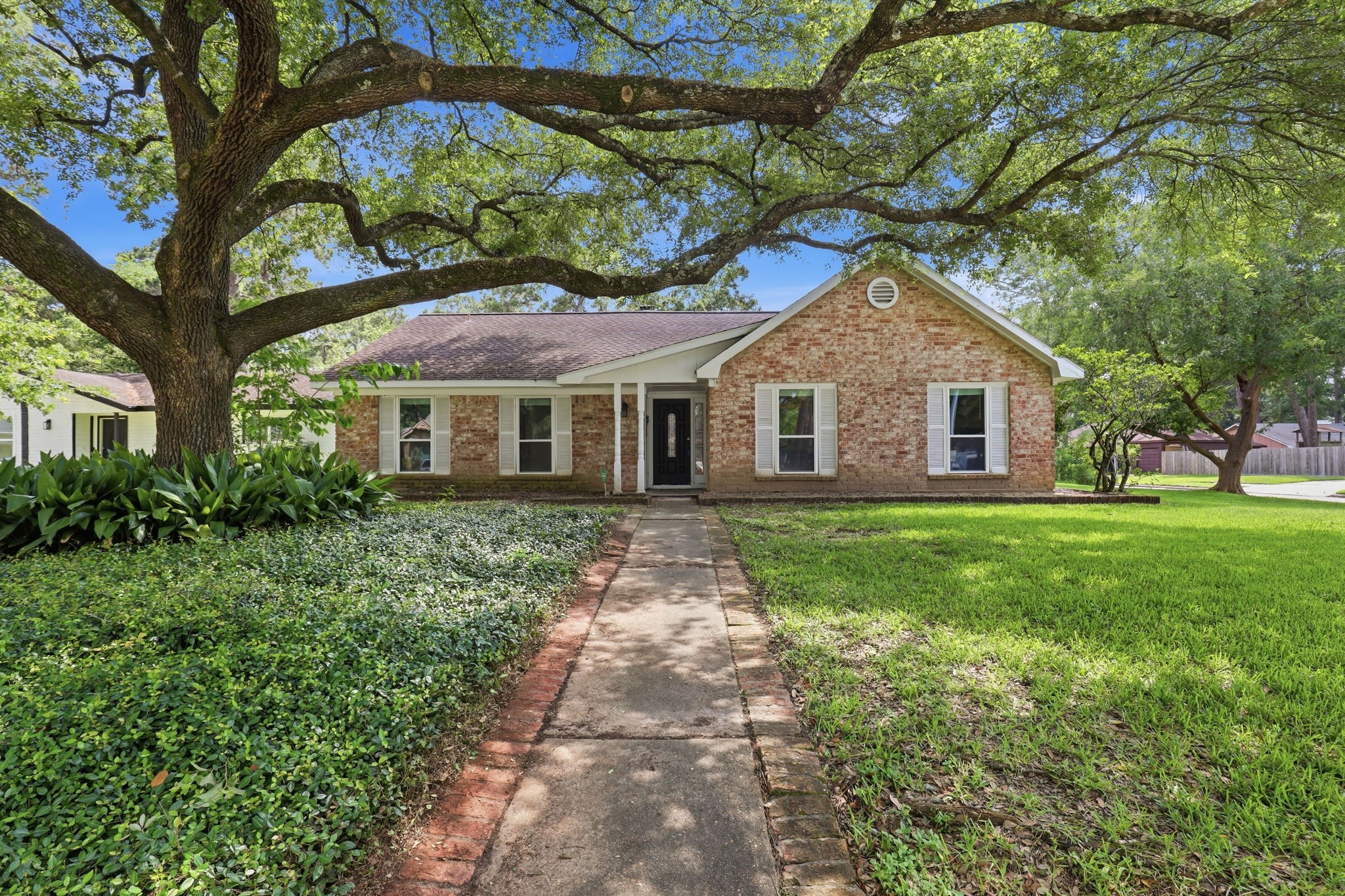 25415 Friar Lake Lane Spring, TX 77373 - Photo 2 of 29 Curb Appeal with Mature Trees & Inviting Front Entry