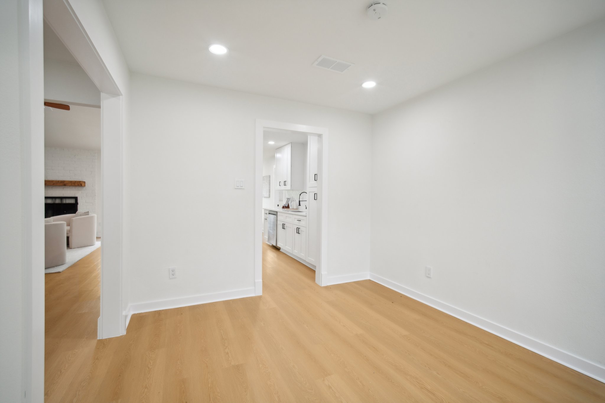 10219 Rutland Village West Austin, TX 78758 - Photo 11 of 33 a view of empty room with wooden floor