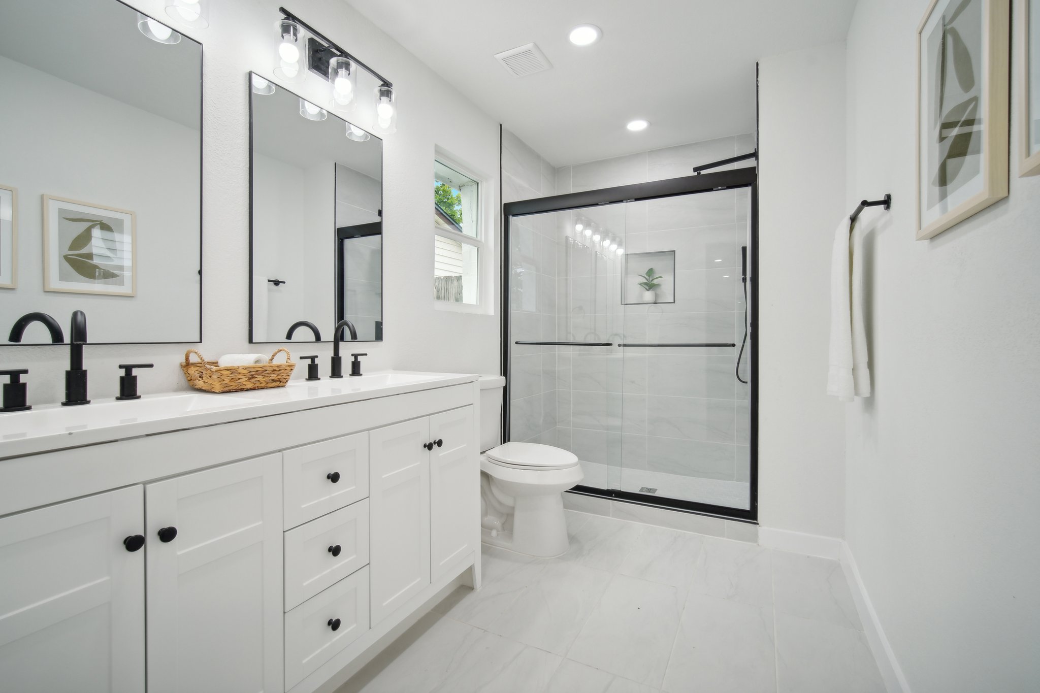 10219 Rutland Village West Austin, TX 78758 - Photo 14 of 33 a bathroom with a toilet sink and shower