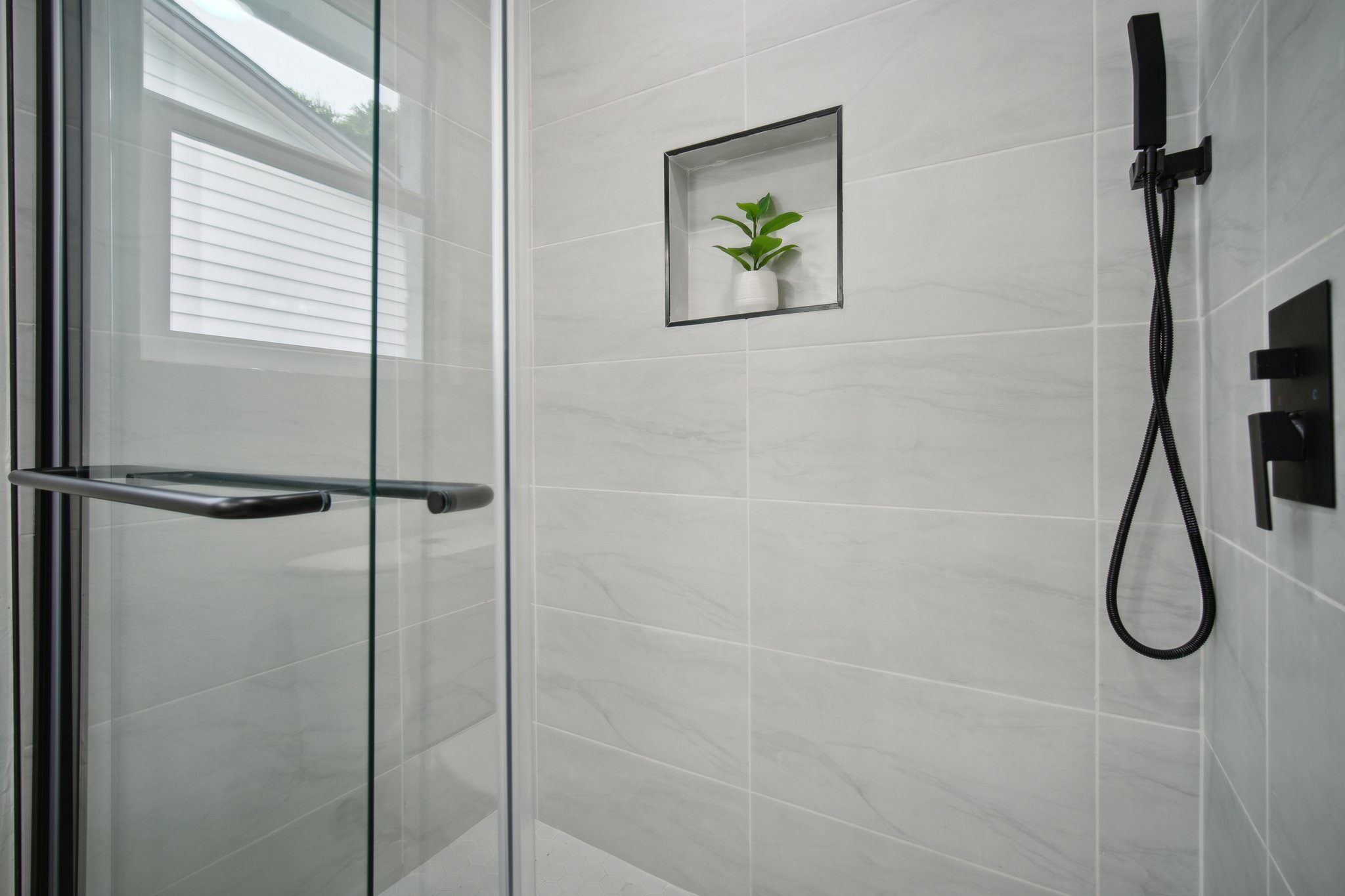 10219 Rutland Village West Austin, TX 78758 - Photo 16 of 33 a bathroom with a shower