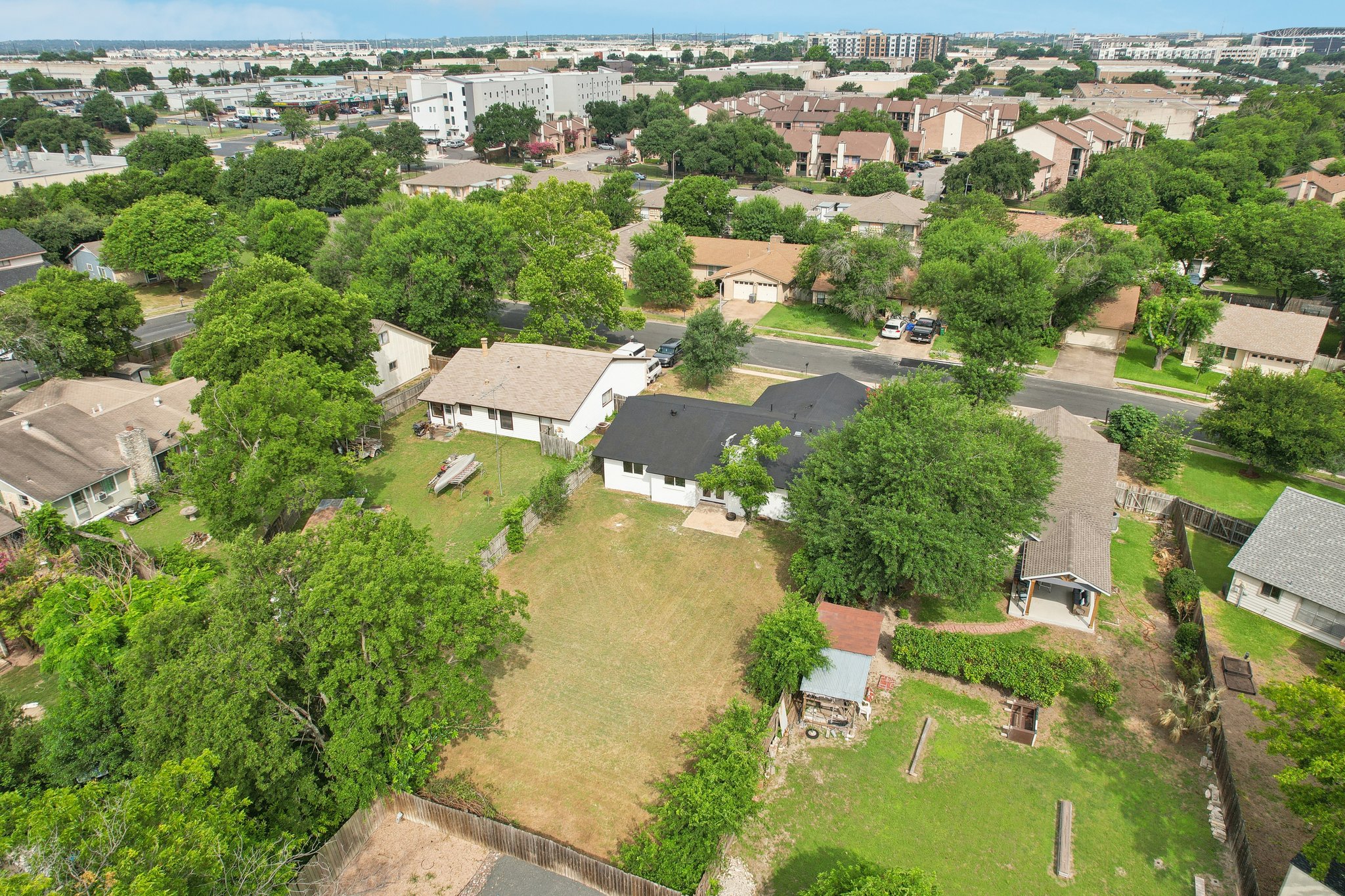 10219 Rutland Village West Austin, TX 78758 - Photo 29 of 33 an aerial view of residential houses with outdoor space and trees