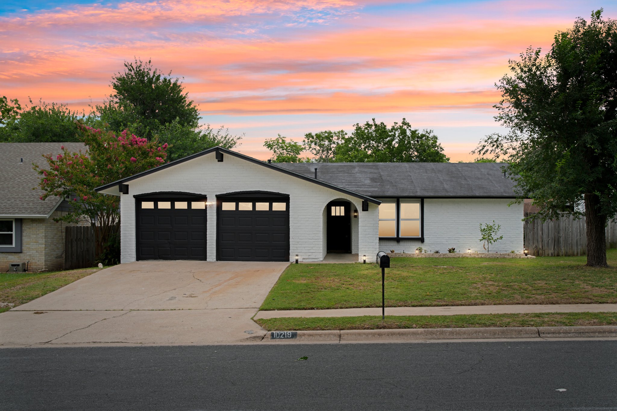 10219 Rutland Village West Austin, TX 78758 - Photo 3 of 33 a house view with a outdoor space