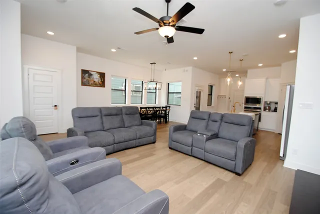a living room with furniture and a window