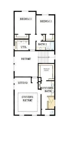 a brick building with a black and white checkered floor