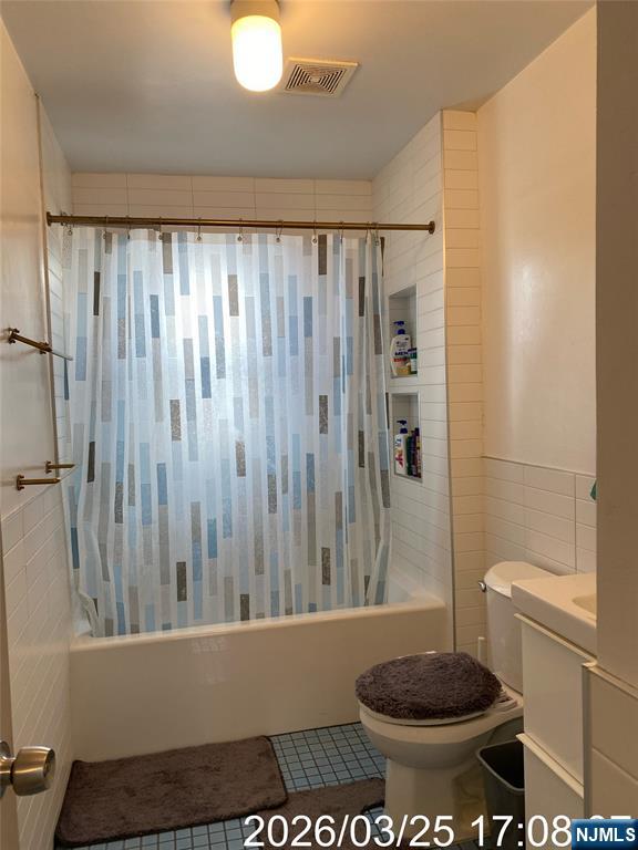 38 Delancy Street, Unit 3 Newark, NJ 07105 - Photo 12 of 16 a bathroom with a toilet and a shower