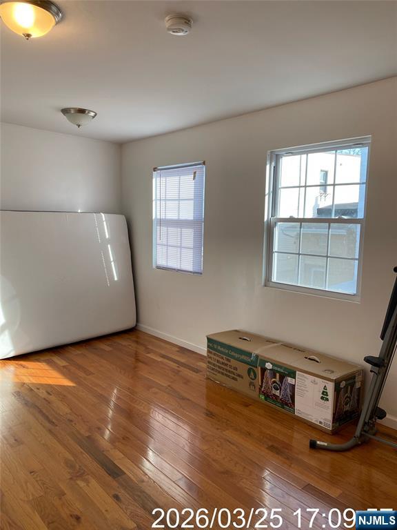 38 Delancy Street, Unit 3 Newark, NJ 07105 - Photo 14 of 16 a view of a room with furniture and a window