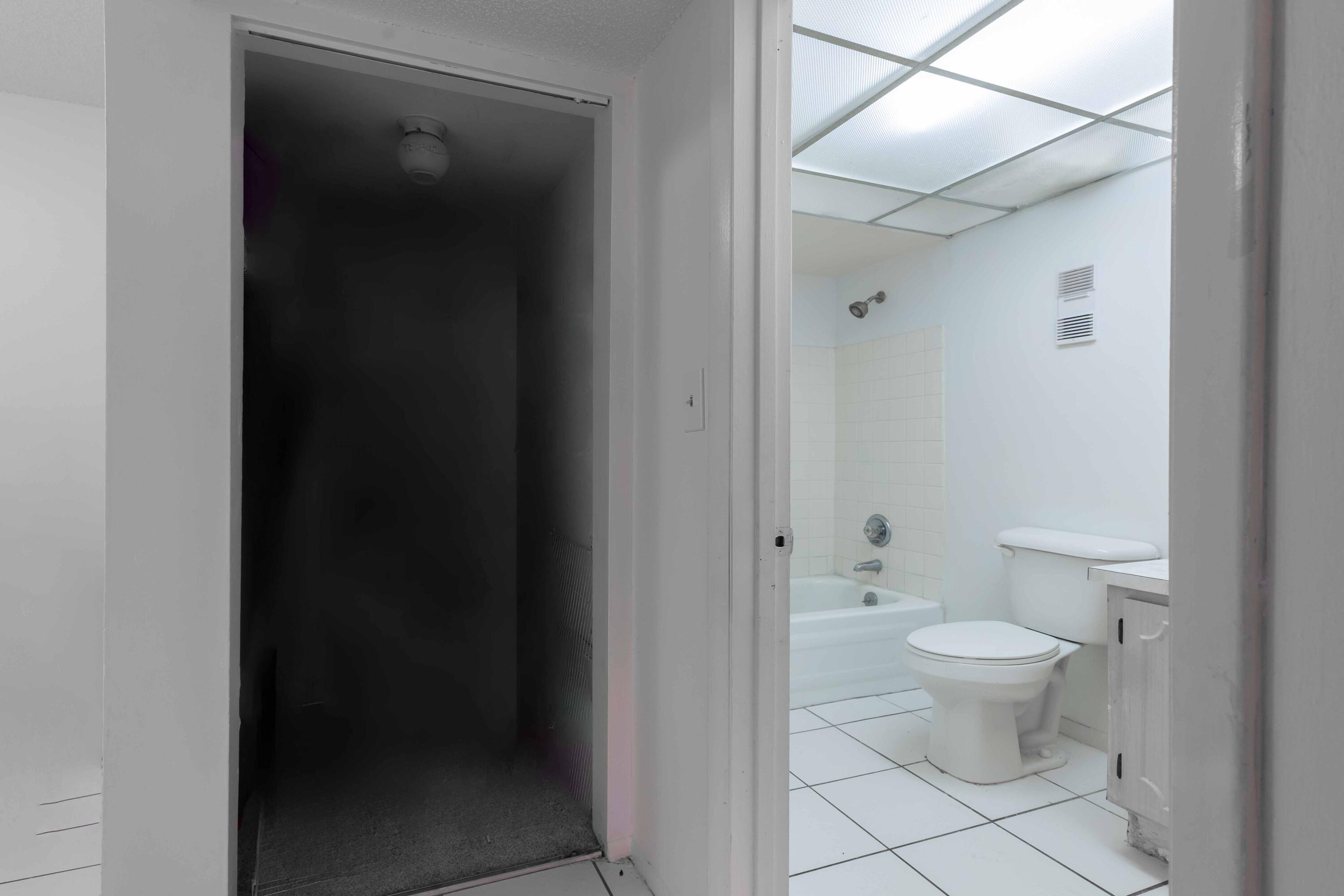 490 Northwest 20th Street, Unit 1050 Boca Raton, FL 33431 - Photo 11 of 23 Guest Bath/Storage Closet