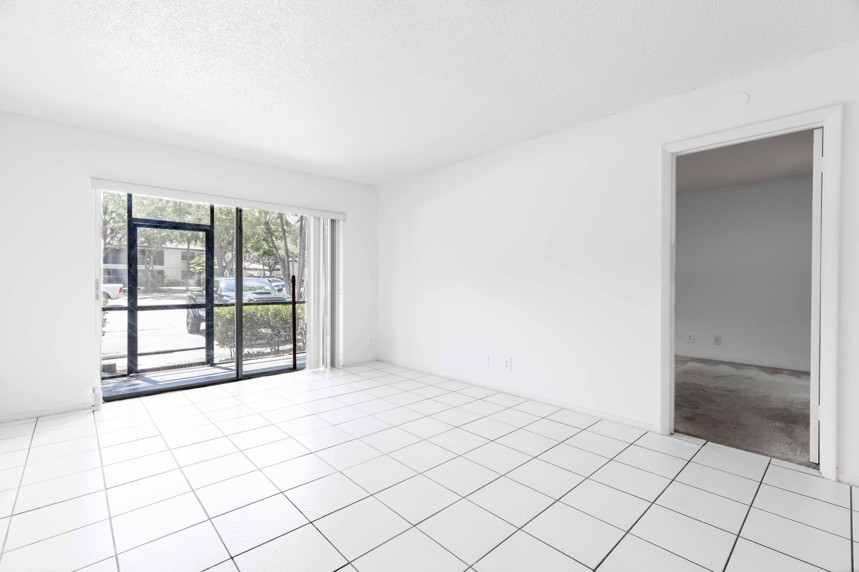 490 Northwest 20th Street, Unit 1050 Boca Raton, FL 33431 - Photo 12 of 23 Living Room
